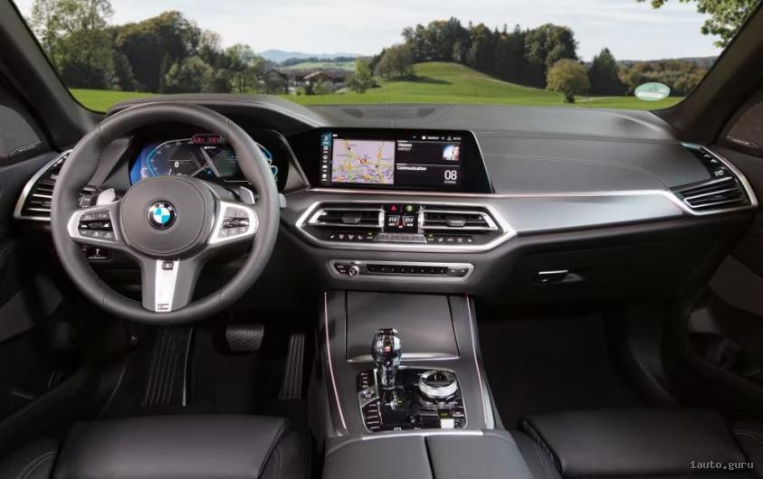 Інтер’єр BMW X5 G05 xDrive45e з передніми сидіннями та центральною консоллю