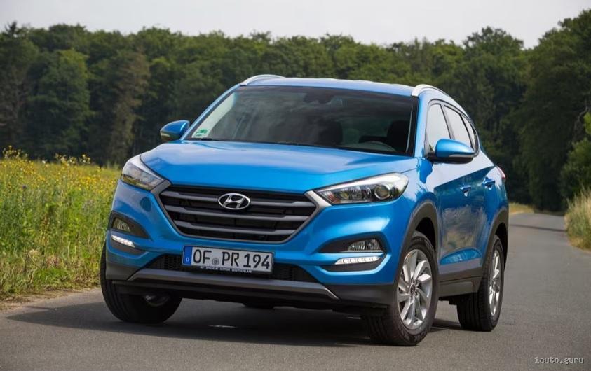 Hyundai Tucson TL до рестайлінгу: кузов спереду в три чверті